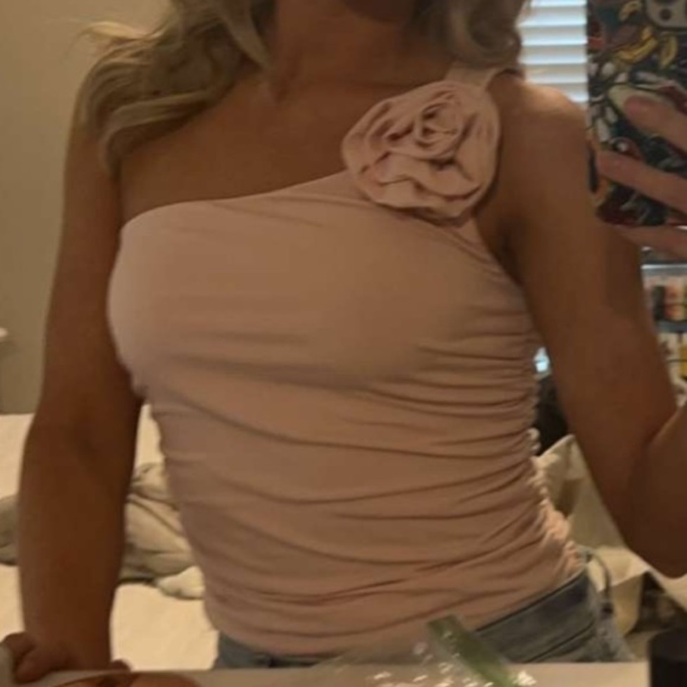 Pink One-Shoulder Top with Floral Accent